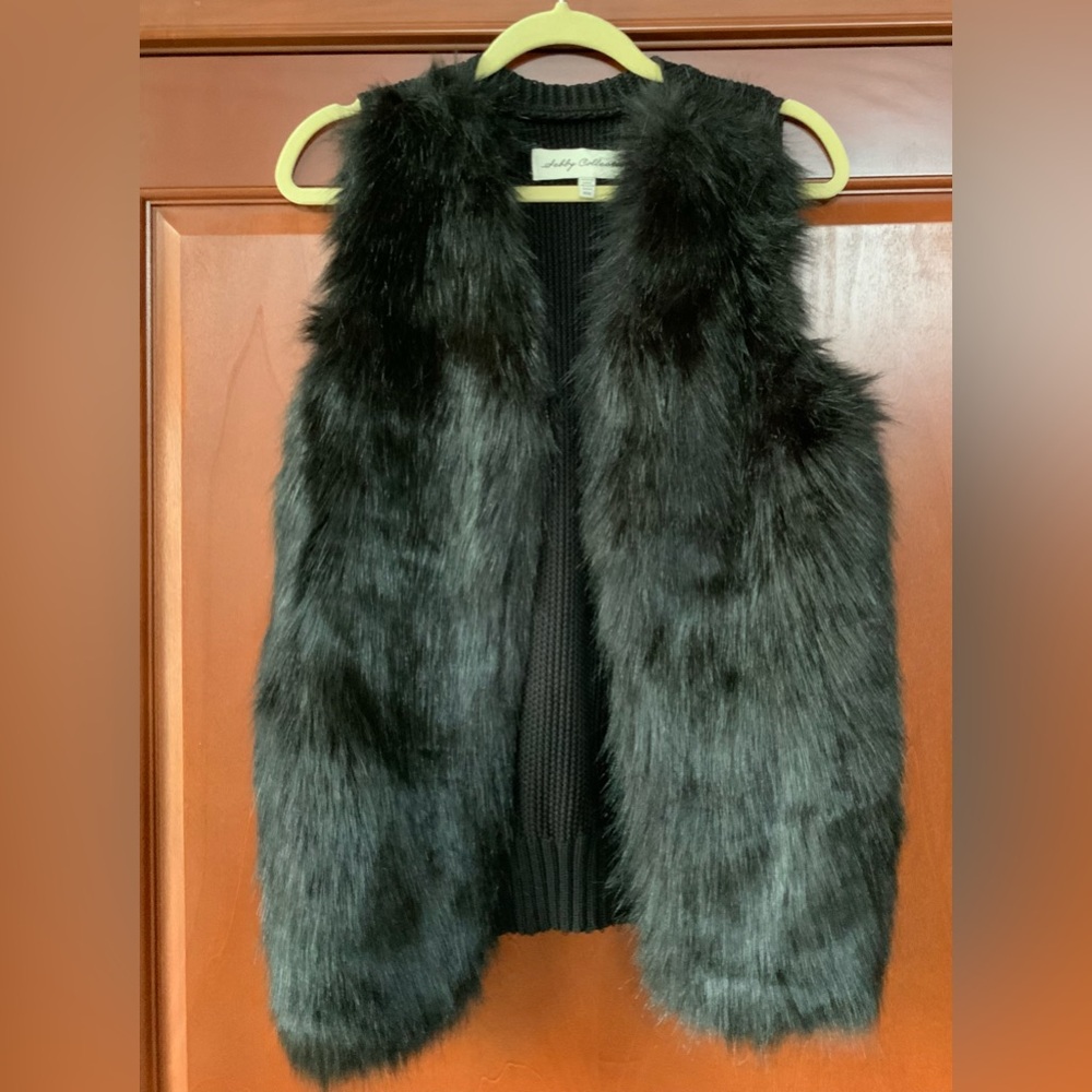 Super stylish faux fur vest.